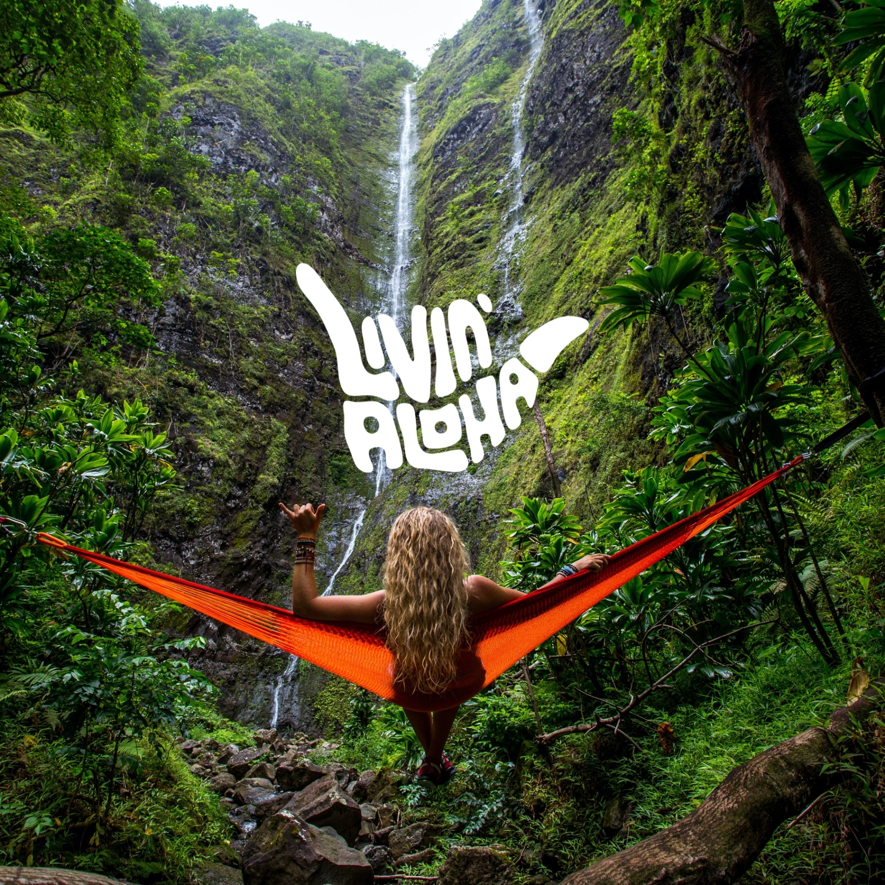 Livin' Aloha — shaka at the waterfall.