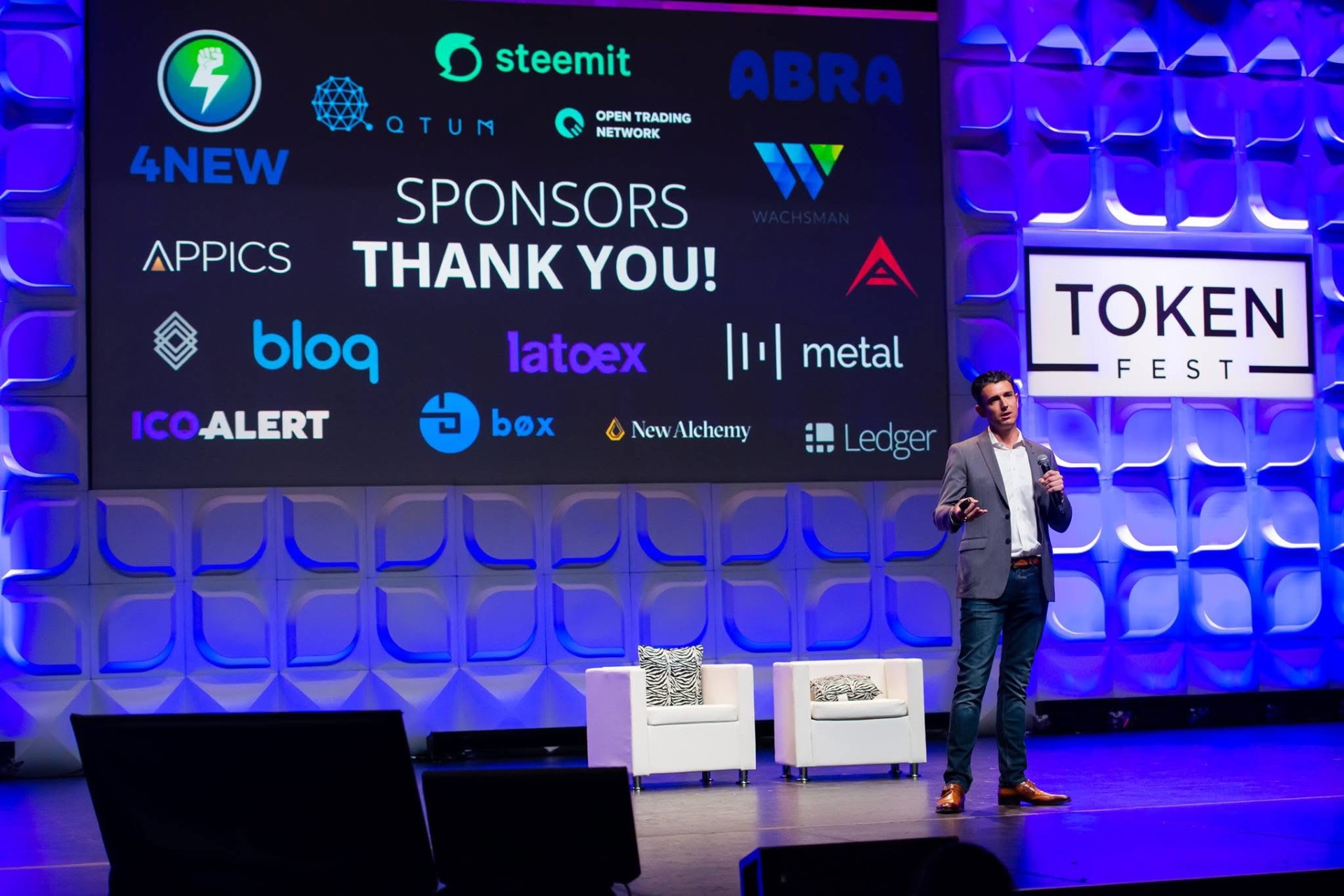Sponsor thank-you wall — main stage.