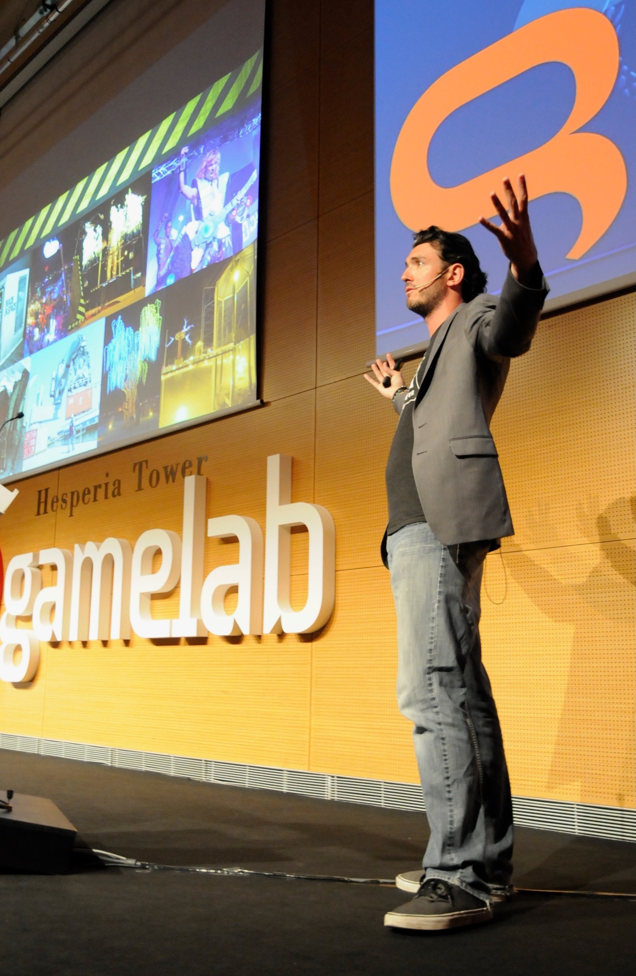 Brinkley Warren speaking on stage — photo 11