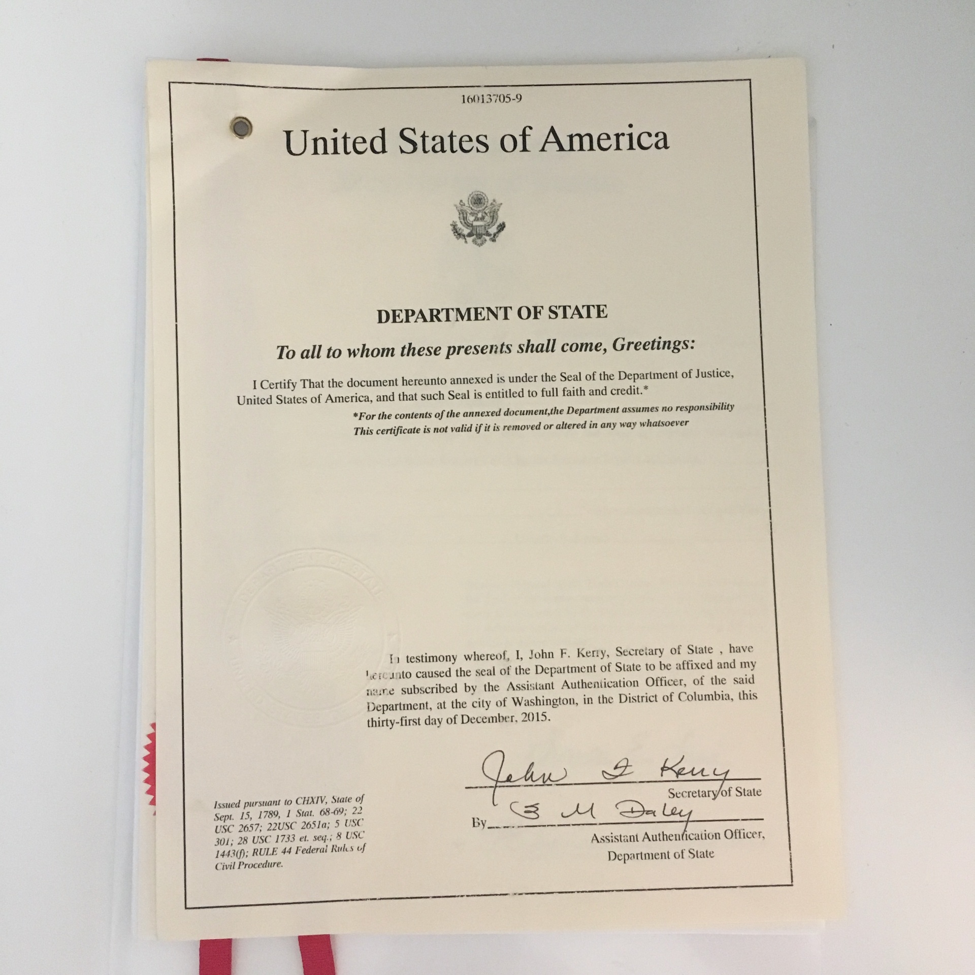 U.S. Department of State authentication — Great Seal certification, signed John F. Kerry, December 31, 2015.